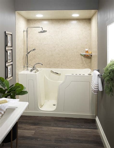 Walk-in tub with grab bars